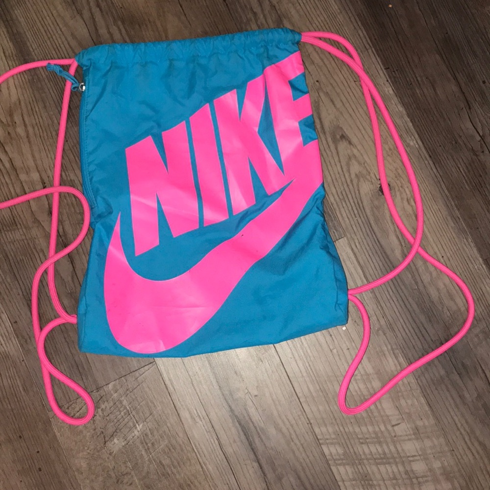 Pink and blue Nike drawstring bag